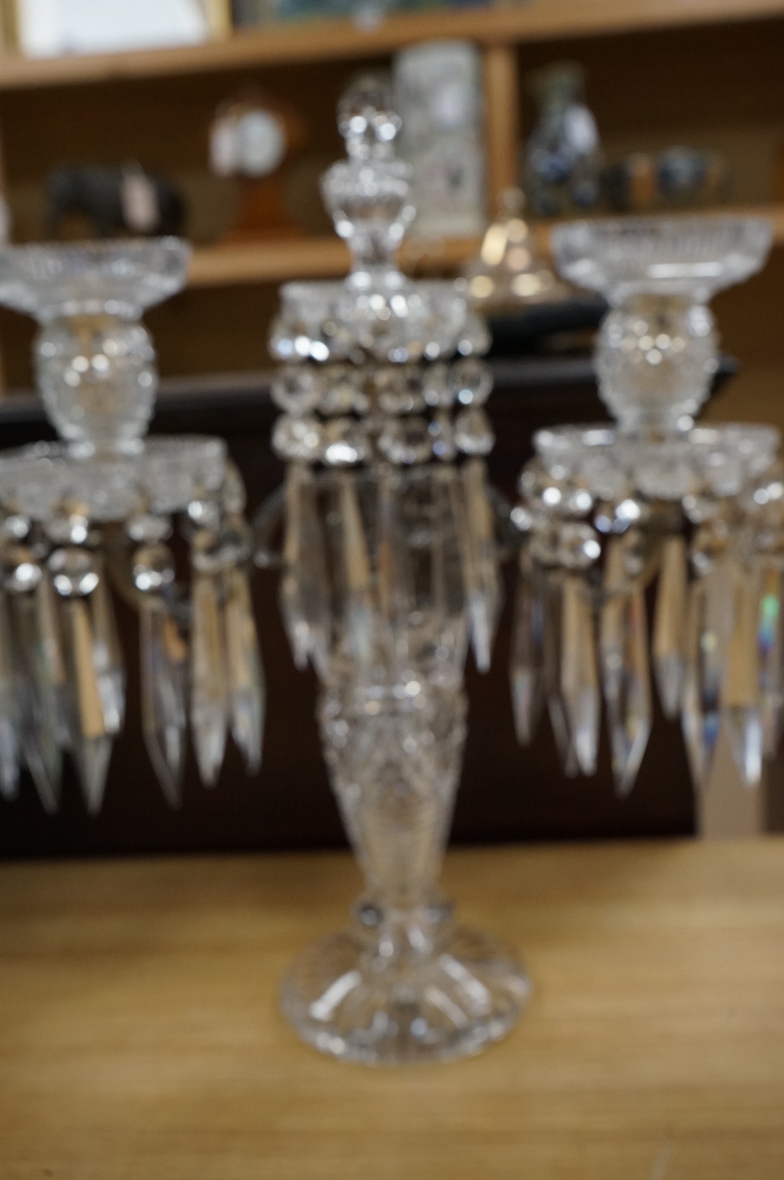 A pair of Victorian cut glass candelabra, probably Perry & Co, in Regency style, for electricity, 38cm